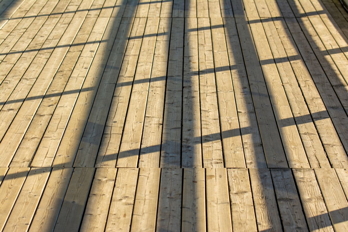 Clean wood deck after pressure washing in Sandy Springs, GA